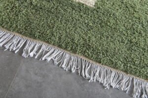Moroccan green rug